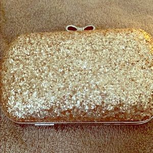 Claire’s Glittered gold Clutch